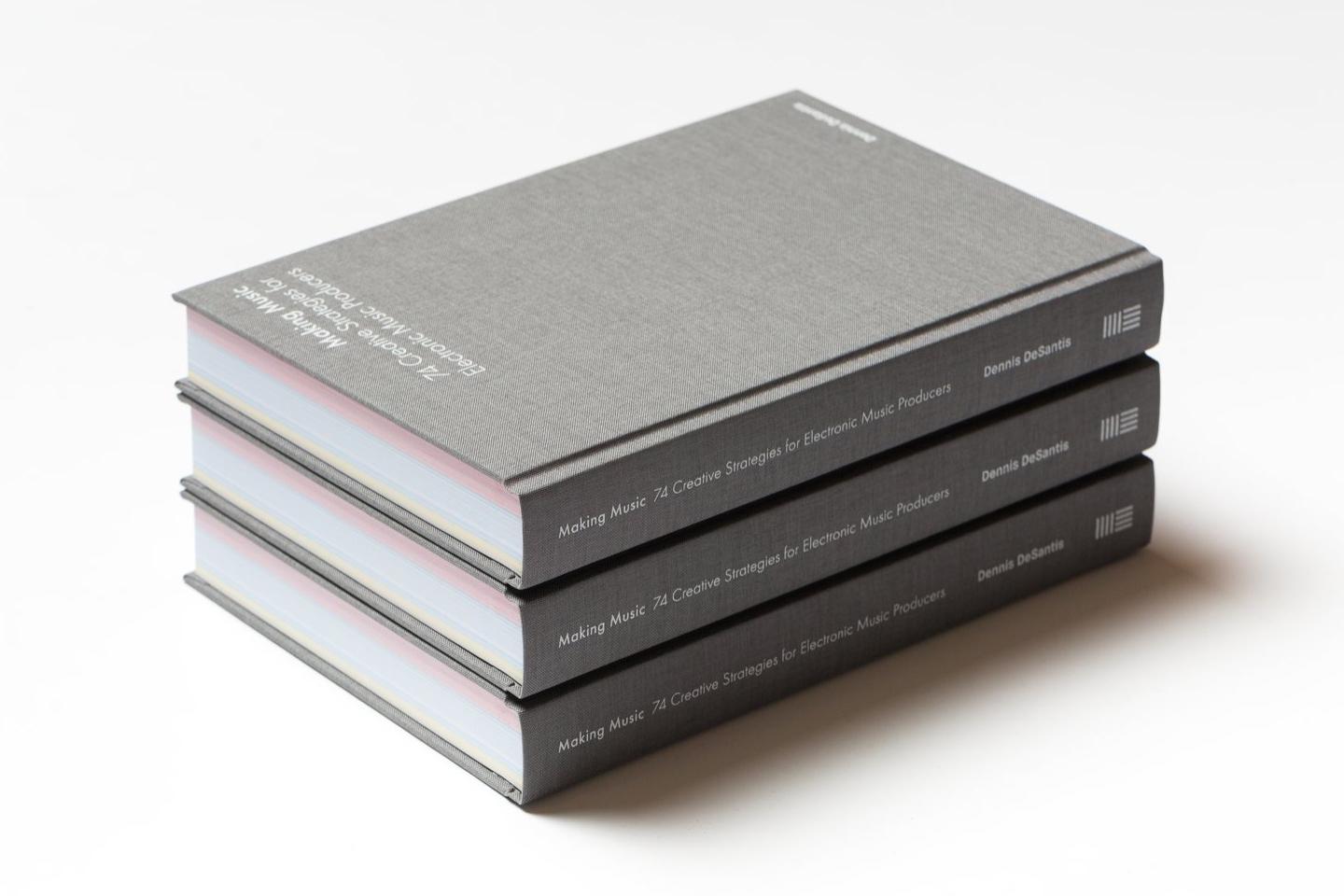 Three copies of the book stacked Three copies of the book stacked